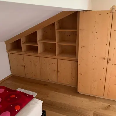 Ein Bett oder Betten in einem Zimmer der Unterkunft Dachgeschoss Ferienwohnung mit Charme - Top floor apartment with charme