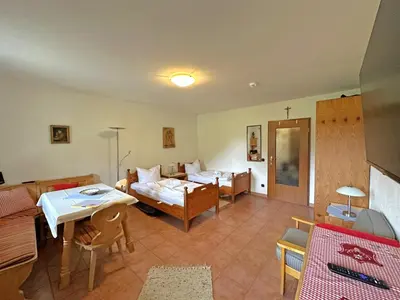 Ein Bett oder Betten in einem Zimmer der Unterkunft Gschwendtnerhof App9 Hoffmann