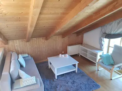 Ein Sitzbereich in der Unterkunft Ferienwohnung am Chiemsee