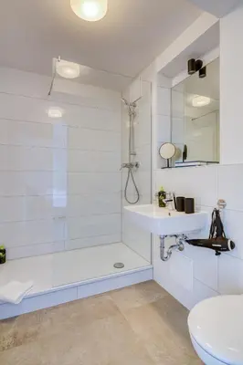 Ein Badezimmer in der Unterkunft Limehome Garching bei München