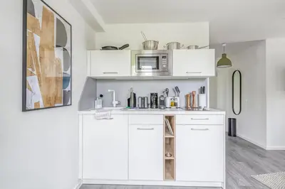 Küche/Küchenzeile in der Unterkunft Limehome Garching bei München