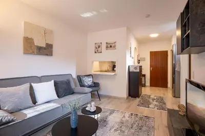Ein Sitzbereich in der Unterkunft Zweizimmer Erdgeschoss Wohnung mit Terrasse 4