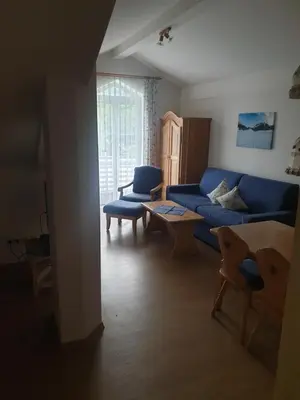 Ein Sitzbereich in der Unterkunft Ferienwohnanlage Brünnstein Wohnung 54