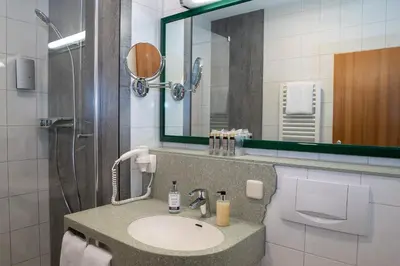 Ein Badezimmer in der Unterkunft Hotel Kastanienhof