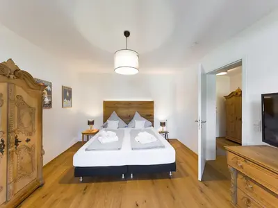 Ein Bett oder Betten in einem Zimmer der Unterkunft Olympia 9