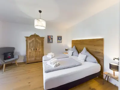 Ein Bett oder Betten in einem Zimmer der Unterkunft Olympia 9