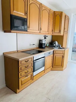 Küche/Küchenzeile in der Unterkunft Großartige 3 Zimmer Ferienwohnung mit Kamin und Garten für 1-6 Personen