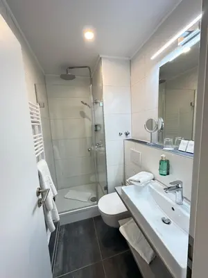 Ein Badezimmer in der Unterkunft Hotel Rappensberger