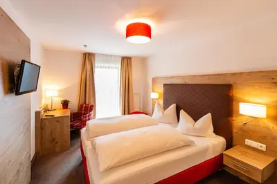 Ein Bett oder Betten in einem Zimmer der Unterkunft Hotel Gasthof Neuwirt