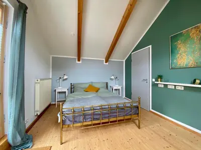 Ein Bett oder Betten in einem Zimmer der Unterkunft Ferienwohnung Röthenbach