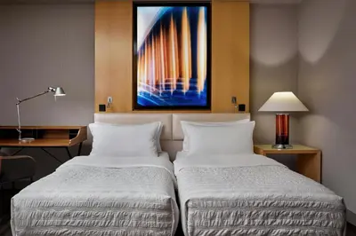 Ein Bett oder Betten in einem Zimmer der Unterkunft Le Meridien Munich