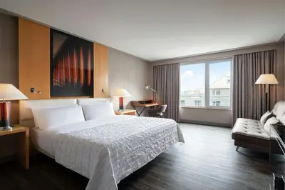 Ein Bett oder Betten in einem Zimmer der Unterkunft Le Meridien Munich