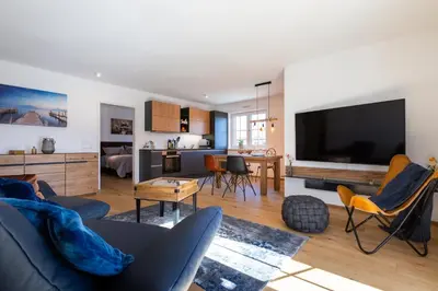 TV/Unterhaltungsangebot in der Unterkunft AD FONTES Suite mit Bergblick & Sauna