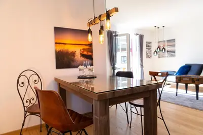Ein Sitzbereich in der Unterkunft AD FONTES Suite mit Bergblick & Sauna