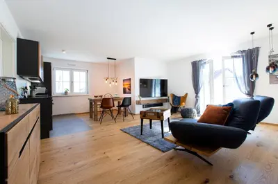 TV/Unterhaltungsangebot in der Unterkunft AD FONTES Suite mit Bergblick & Sauna