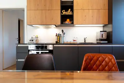 Küche/Küchenzeile in der Unterkunft AD FONTES Suite mit Bergblick & Sauna
