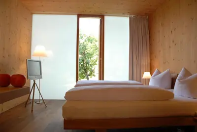 Ein Bett oder Betten in einem Zimmer der Unterkunft Hörger Biohotel und Tafernwirtschaft
