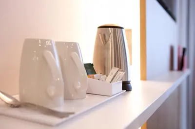 Kaffee-/Teezubehör in der Unterkunft Holiday Inn Express Munich - Olympiapark by IHG