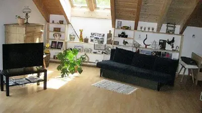 Ein Sitzbereich in der Unterkunft Jagdschlössl Tegernsee-Schliersee