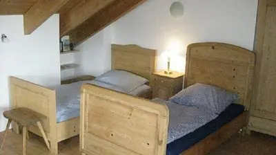 Ein Bett oder Betten in einem Zimmer der Unterkunft Jagdschlössl Tegernsee-Schliersee