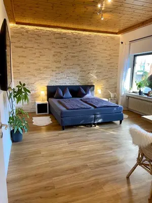 Ein Sitzbereich in der Unterkunft Puppi' s Nest mit Alpspitzblick in Garmisch- Partenkirchen