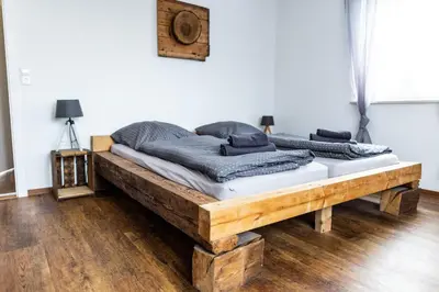 Ein Bett oder Betten in einem Zimmer der Unterkunft Ferienwohnung Kaufbeuren