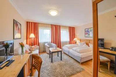 Ein Bett oder Betten in einem Zimmer der Unterkunft Der Kramerhof