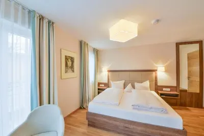 Ein Bett oder Betten in einem Zimmer der Unterkunft Der Kramerhof