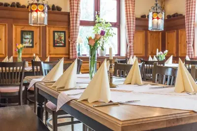 Ein Restaurant oder anderes Speiselokal in der Unterkunft Der Kramerhof