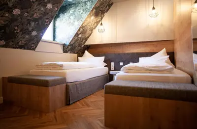 Ein Bett oder Betten in einem Zimmer der Unterkunft Bayerischer Hof