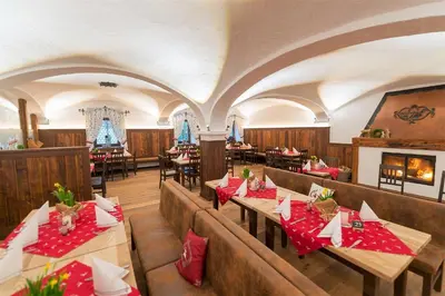 Ein Sitzbereich in der Unterkunft Landgasthof Goldener Pflug