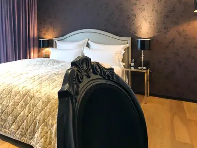 Ein Bett oder Betten in einem Zimmer der Unterkunft La Mansion Vi Vadi Hotel