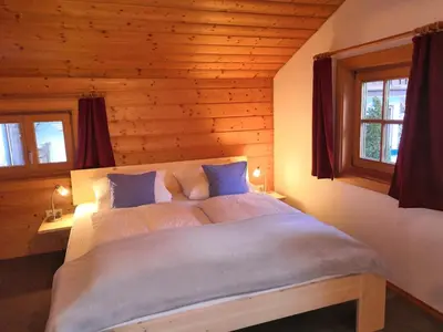 Ein Bett oder Betten in einem Zimmer der Unterkunft Ferienhaus Erika