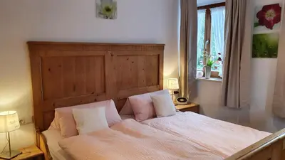 Ein Bett oder Betten in einem Zimmer der Unterkunft Gästezimmer Vogtareuth Rinser