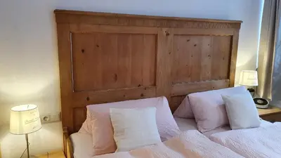 Ein Bett oder Betten in einem Zimmer der Unterkunft Gästezimmer Vogtareuth Rinser