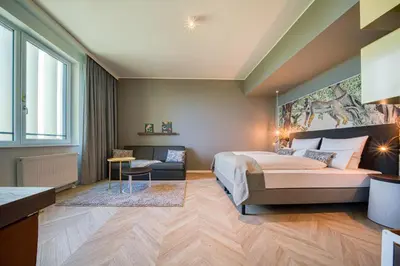 Ein Bett oder Betten in einem Zimmer der Unterkunft Vienna House Easy by Wyndham Augsburg