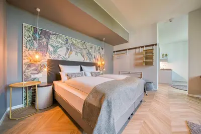 Ein Bett oder Betten in einem Zimmer der Unterkunft Vienna House Easy by Wyndham Augsburg