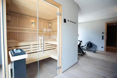 Das Fitnesscenter und/oder die Fitnesseinrichtungen in der Unterkunft BergLoft 360 mit Sauna und Fitness