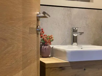 Ein Badezimmer in der Unterkunft BergLoft 360 mit Sauna und Fitness