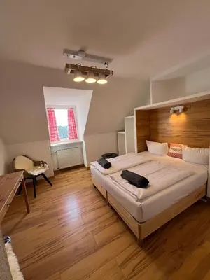 Ein Bett oder Betten in einem Zimmer der Unterkunft Runas Hotel