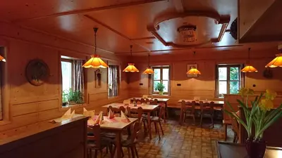 Ein Restaurant oder anderes Speiselokal in der Unterkunft Fischerhof