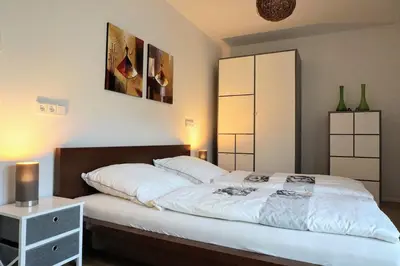 Ein Bett oder Betten in einem Zimmer der Unterkunft Sonnengarten Olivia