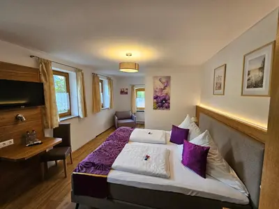Ein Bett oder Betten in einem Zimmer der Unterkunft Land-gut-Hotel Gasthof Waldschänke