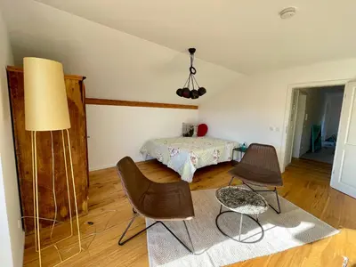Ein Bett oder Betten in einem Zimmer der Unterkunft Chiemsee Living