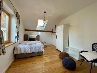 Ein Bett oder Betten in einem Zimmer der Unterkunft Chiemsee Living