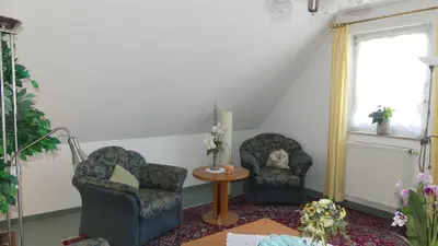 Ein Sitzbereich in der Unterkunft Ferienwohnung Mittl