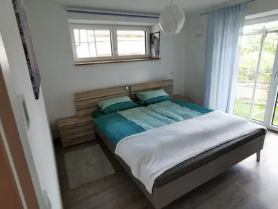 Ein Bett oder Betten in einem Zimmer der Unterkunft Ferienwohnung MIA-LENA