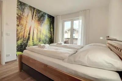 Ein Bett oder Betten in einem Zimmer der Unterkunft Bergsonne