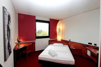 Ein Bett oder Betten in einem Zimmer der Unterkunft Ara Hotel Comfort