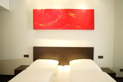 Ein Bett oder Betten in einem Zimmer der Unterkunft Ara Hotel Comfort